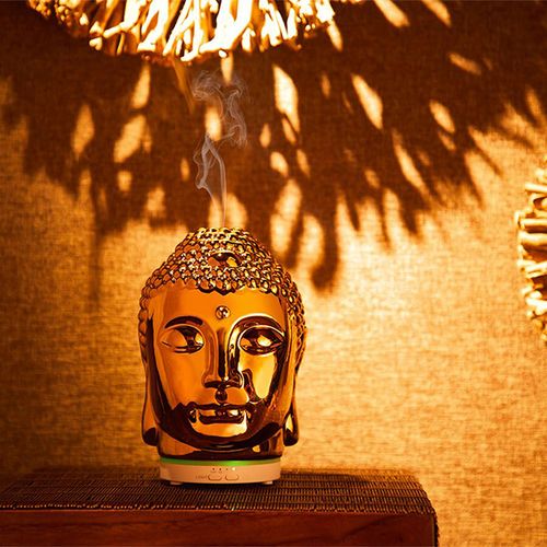 Gouden buddha luchtbevochtiger met geurdispenser